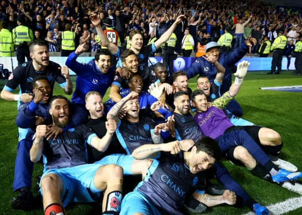 Sheffield Wednesday celebrate after the final whistle. Picture: Gareth Fuller/PA