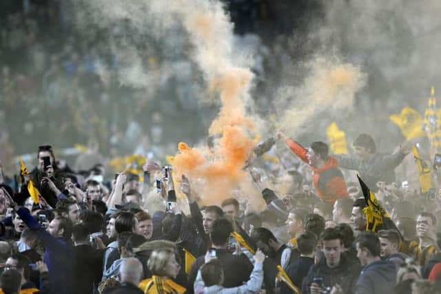 Pitch invasion at full time.  Picture Bruce Rollinson