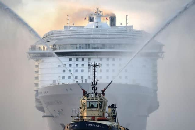 The world's largest passenger ship, MS Harmony of the Seas, owned by Royal Caribbean, makes her way up Southampton Water into Southampton ahead of her maiden cruise. Image: Andrew Matthews/PA Wire