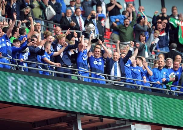 FC Halifax Town celebrate with the FA Trophy after victory over Grimsby Town (
Picture : Jonathan Gawthorpe).