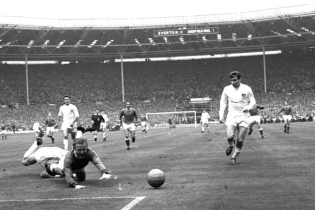 Everton's Alex Young is brought down in the Sheffielield  Wednesday penalty area May 1966