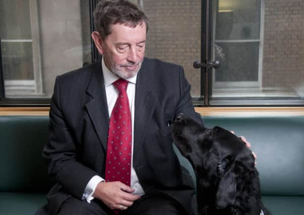 David Blunkett was the Home Secretary who negotiated passport checks with France.