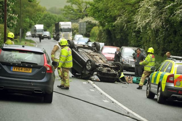 Emergency workers at the scene. Picture: Tony Johnson