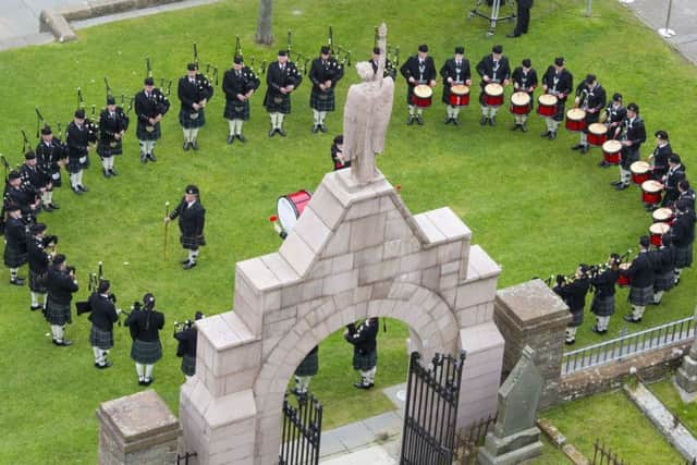 The Kirkwall Pipe Band playing before a service at St Magnus Cathedral in Kirkwall, Orkney, to mark the centenary of the Battle of Jutland.