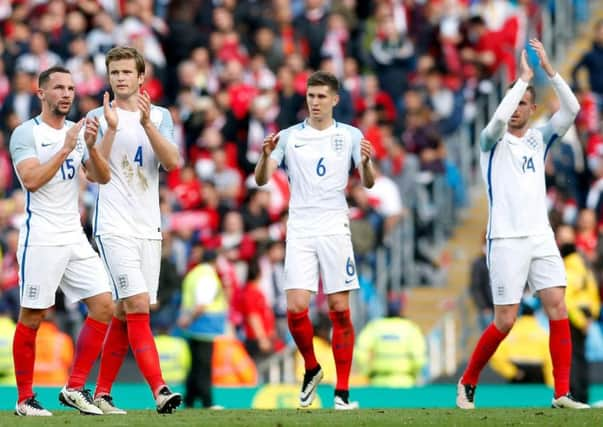 Odd man out: England's Danny Drinkwater, Eric Dier, John Stones and Jordan Henderson.