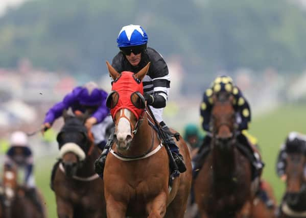 Blaine ridden by Kieren Fallon comes home to win the Investec Asset Management Stakes (Handicap).