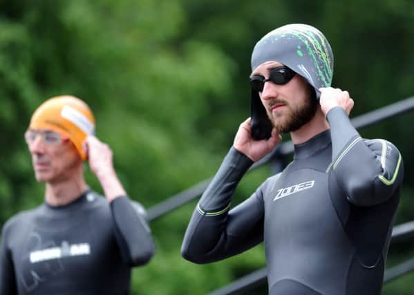 Reporter Jonny Brown at Roundhay Park's Waterloo Lake. Picture by Jonathan Gawthorpe.