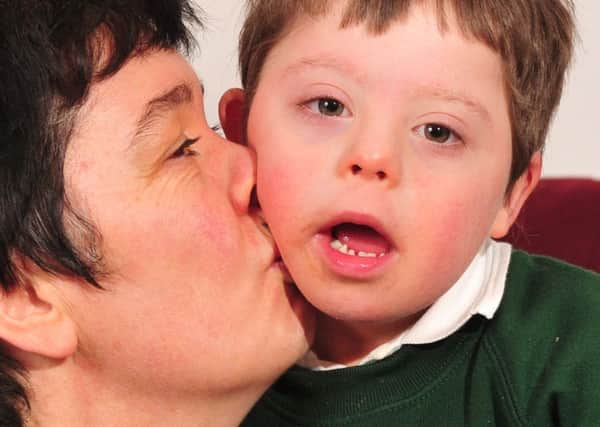 Lyall Cookward with his mum Sharron Cook