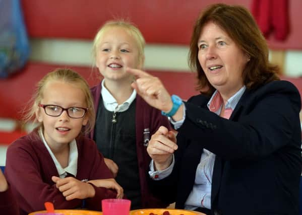 Carmel McConnell with pupils at Havercroft Academy, Wakefield