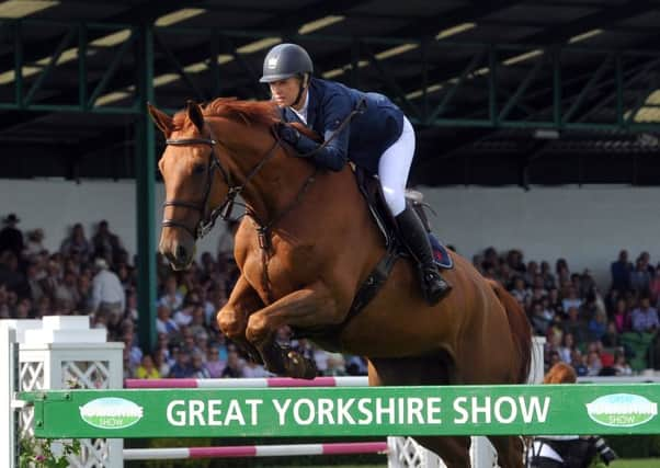 Leap to triumph: Laura Renwick aboard Heliodor Hybris wins the Cock o The North Championship.