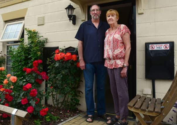 Peter and Sue Douglas at their home on the Shimmer Estate in Mexborough which could be demolished to make way for HS2. (Picture Scott Merrylees).