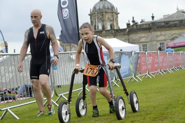 Bailey Matthews on his second triathlon at Castle Howard. Picture: Bruce Rollinson