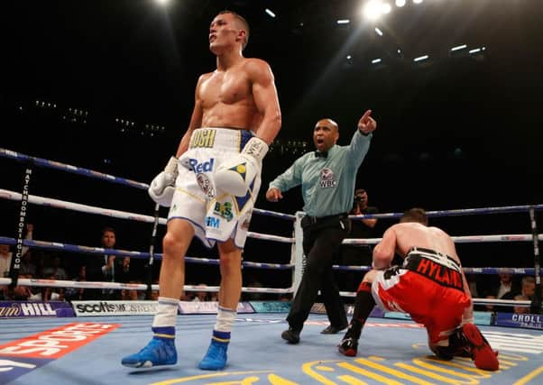 Josh Warrington (left) and Patrick Hyland during their WBC International Featherweight Championship bout.