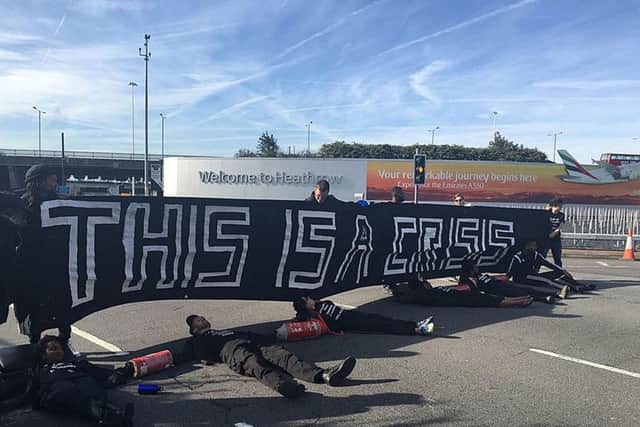 Twitter picture of Black Lives Matter protesters lying on the road which has brought traffic heading to Heathrow airport to a standstill.