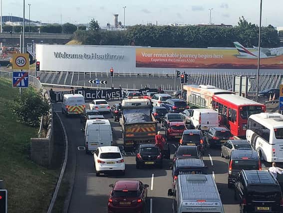 Twitter picture of Black Lives Matter protesters lying on the road which has brought traffic heading to Heathrow airport to a standstill.