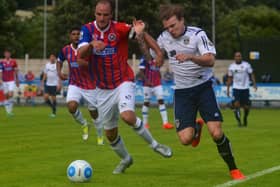 Guiseley's Jordan Preston, right, takes on Dagenham and Redbridge's Scott Doe. PIC: James Hedley.