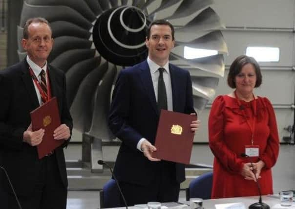 Sheffield Council leader Julie Dore at the signing of the draft devolution deal with George Osborne and Barnsley Council leader Sir Steve Houghton last year.