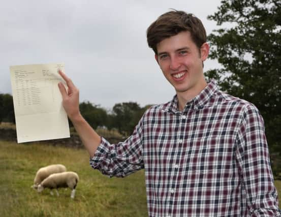 Ben Walker celebrates exam success.