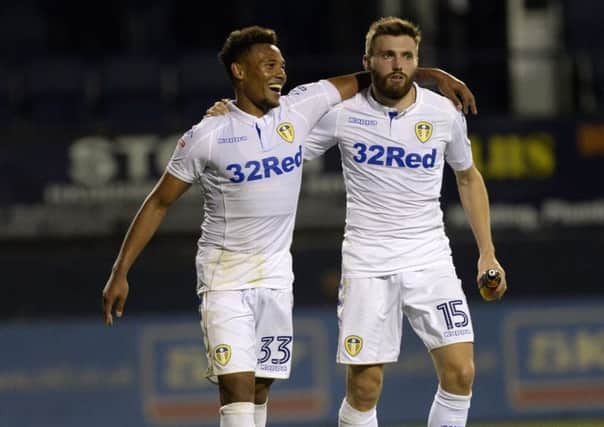 Tyler Denton and Stuart Dallas at full-time. (Picture: Bruce Rollinson)