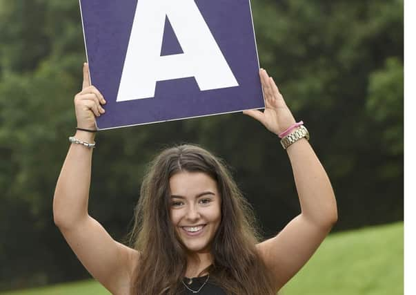 Here is another release and photo from todays GCSE results.  I have also attached a photo of weightlifter Jo Dobson, taken at school this morning.