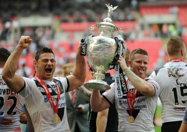 Hull's Steve Michaels, pictured right with Mark Minichiello, celebrate the win at Wembley. Picture : Jonathan Gawthorpe