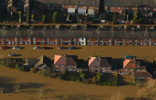 Huntingdon Road and Yearsley Crescent covered by floodwater after the River Ouse and River Foss burst their banks in York city centre, last December