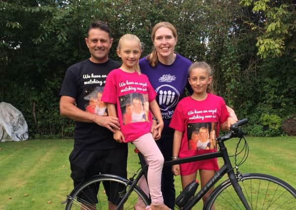 Debbie Cundy with her ffriend Jane's husband Jason and daughters Romany and Amelia