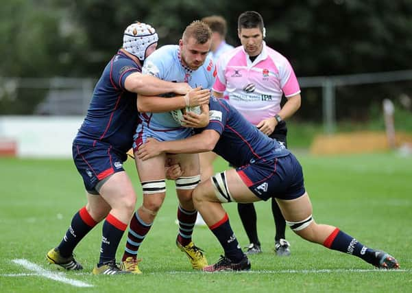 NO WAY THROUGH: Rotherham Titans' Dan Grange finds his route blocked against London Scottish. Picture: Scott Merrylees