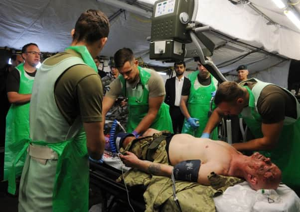 International visitors see a 52-bed tented field hospital in Dishforth, North Yorkshire and meet the medics who go on stand-by to deploy with it. Pictures: Tony Johnson.