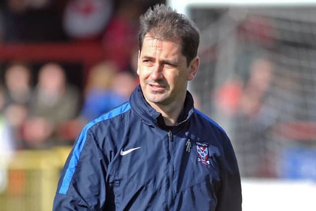 Jackie McNamara has agreed to continue at York until a replacement is found.