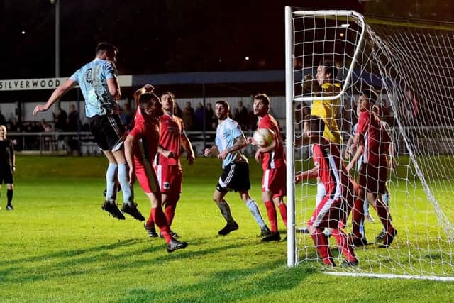 Liversedge's Joe Walton has an effort cleared by Chris Jenkinson, who scored an own goal for Bridlington