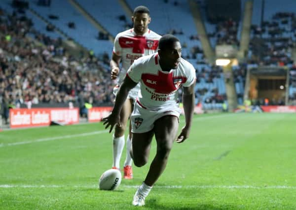 GOING THROUGH: Englands Jermain McGillvary scores his sides fifth try against Scotland. Picture: Simon Cooper/PA.