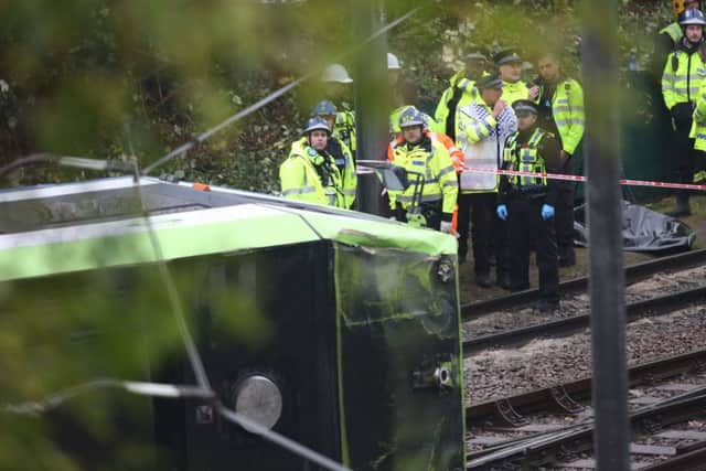 The scene after a tram overturned in Croydon, south London, trapping five people and injuring another 40.