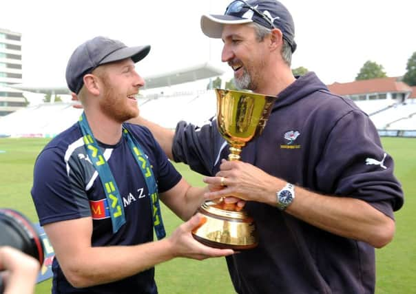 FROM ME TO YOU: Yorkshire's Andrew Gale and Jason Gillespie celebrate after winning the championship back in 2014. Gale could be about to replace Gillespie as first-team coach. Picture Jonathan Gawthorpe.