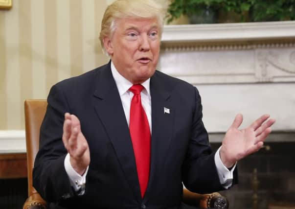 President-elect Donald Trump speaks to members of the media during his visit to the White House. (PA).