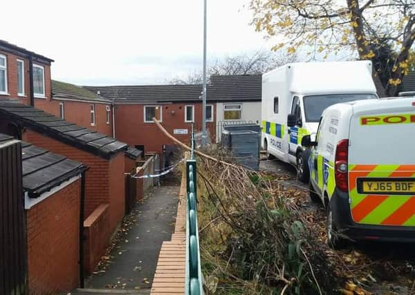 Police at the scene in St John's Close, Hyde Park, at the weekend.