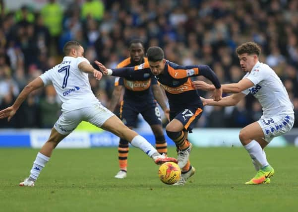 Leeds United's Kalvin Phillips (right) and Kemar Roofe (left) challenge Newcastle United's Ayoze Perez. (Picture Nigel French/PA Wire)