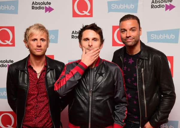 Dominic Howard, Matt Bellamy and Chris Wolstenholme of Muse