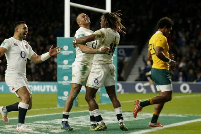 England's Jonathan Joseph celebrates scoring their fourth try against Australia. Picture: Paul Harding/PA