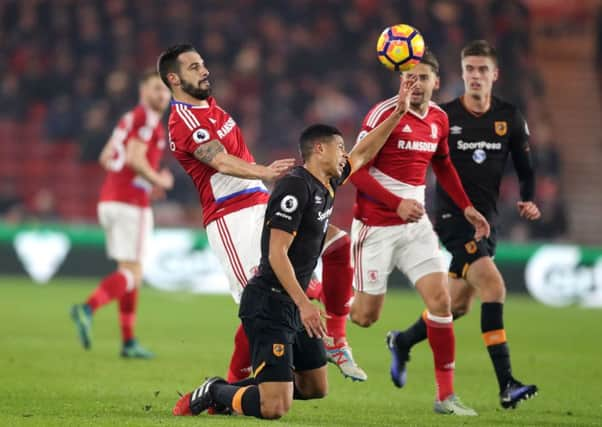 Hull City's Curtis Davies and Middlesbrough's Alvaro Negredo battle for the ball.