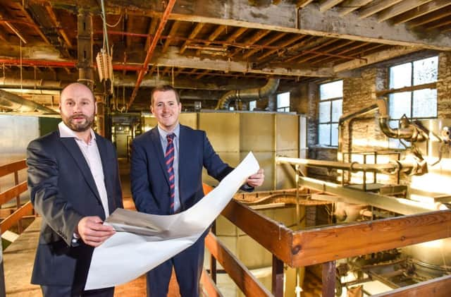 New life for former Mill: Prospect Estates Rob Cooke (L) and Sanderson Weatheralls Craig Watson (R) look over the plans for the former Westwood Yarns mill