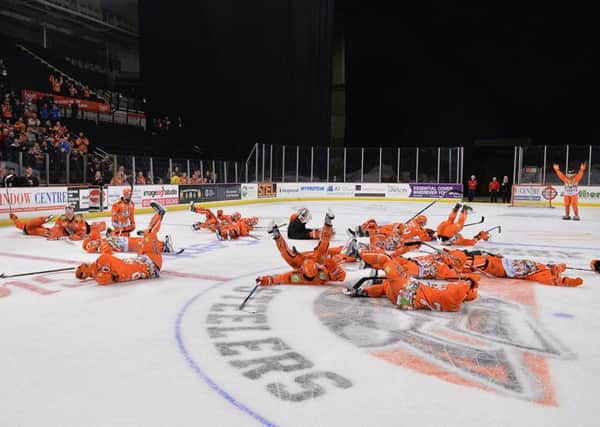 Sheffield Steelers' all celebrate the now traditional post-match 'Eddy'. Picture Dean Woolley.