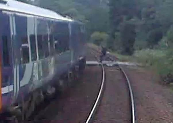 A cyclist coming within inches of being killed by a train near Leeds