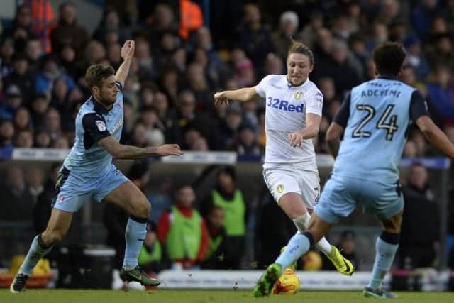 Luke Ayling moves past Kirk Broadfoot and Tom Adeyemi.
 (Picture: Bruce Rollinson)