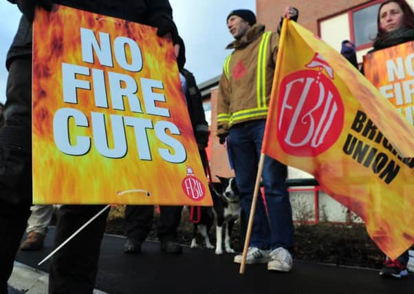 11 December 2015.......   objectors protesting to the proposed closure of Moortown fire station - at the official opening of Killingbeck fire station in Leeds. Picture Tony Johnson