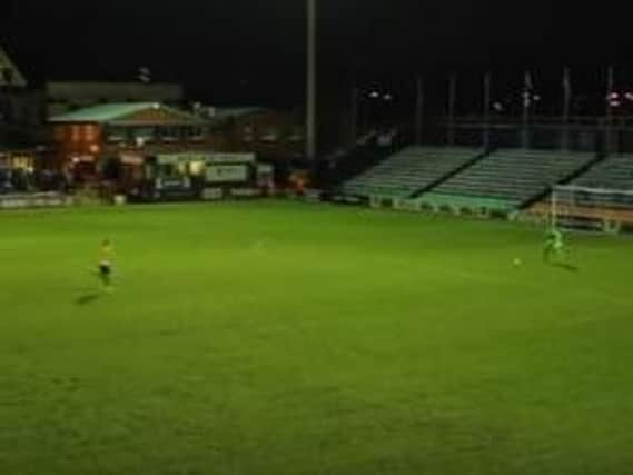 Uh-oh! Stockport County goalkeeper Ben Hinchliffe attempts to trap the ball in the 89th minute