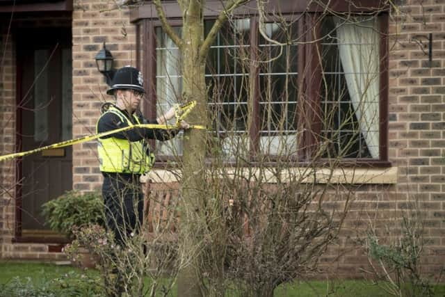 Police activity in the Woodthorpe area of York, where a teenager was arrested Monday after the death of a seven-year-old girl.