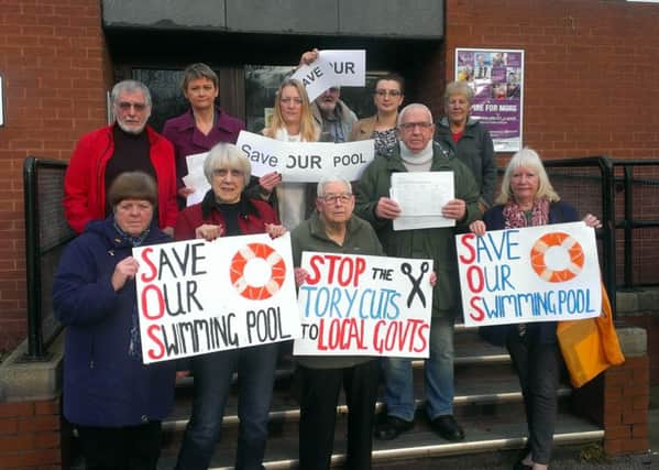 Protesters gather at Castleford swimming pool.