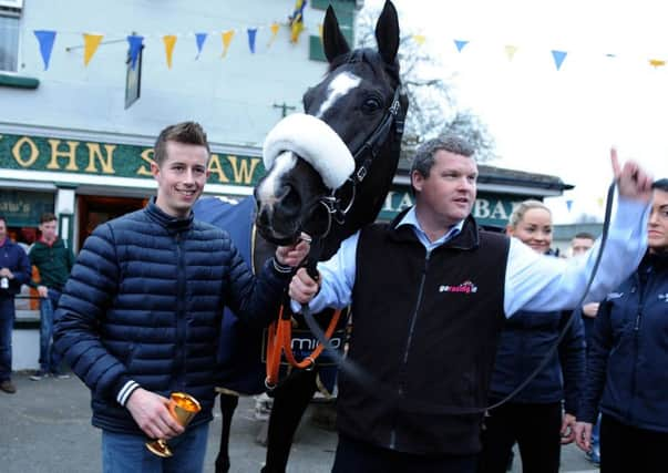 Trainer Gordon Elliott (right) jockey Bryan Cooper (left) and Don Cossack.