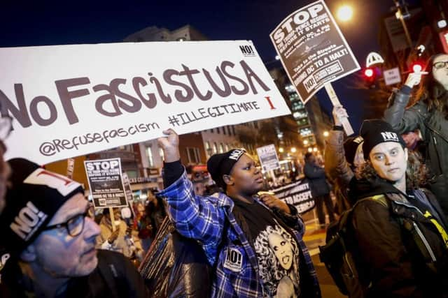 Protesters gather ahead of the inauguration of Donald Trump.